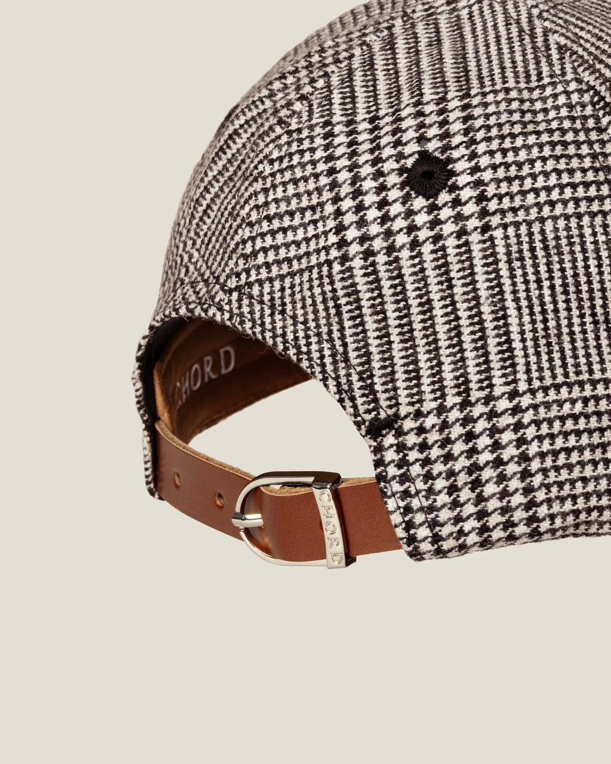 Windsor Glen Plaid women’s baseball cap by CHORD in black and white glen plaid wool with silver-plated hardware
