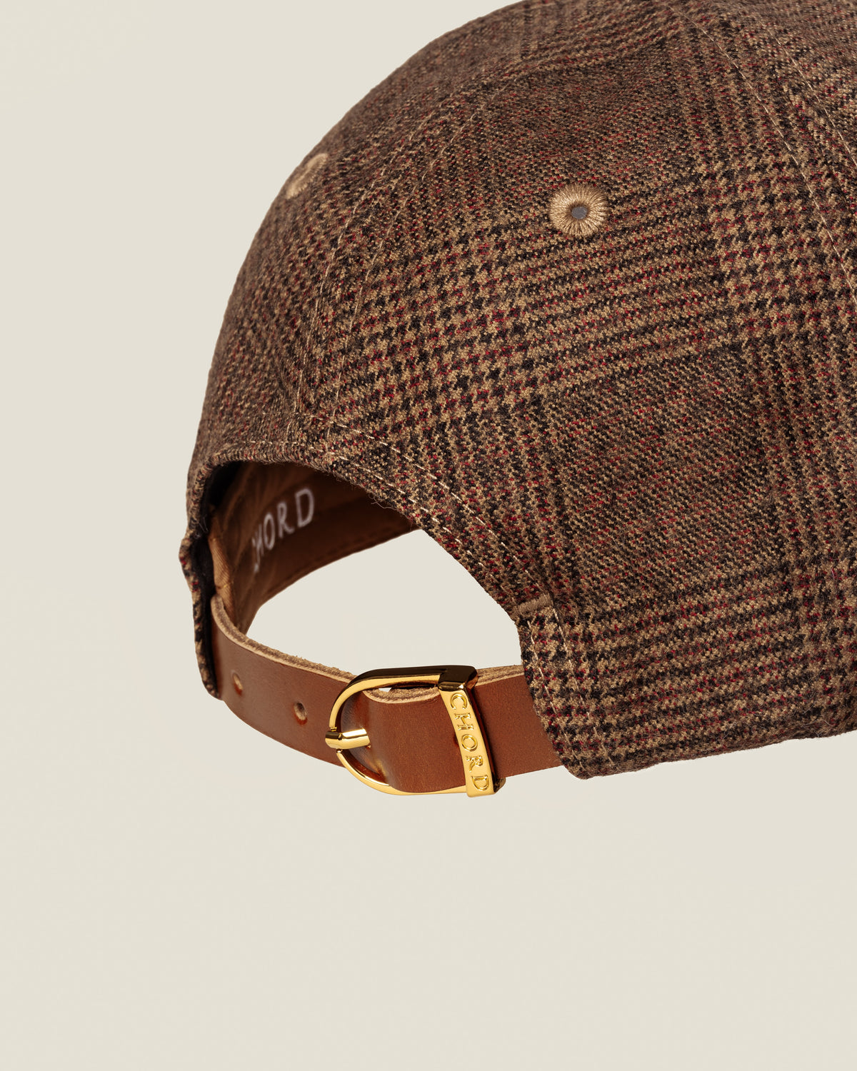 Chatsworth Glen Plaid women’s baseball cap by CHORD in brown and maroon glen plaid wool with gold-plated hardware