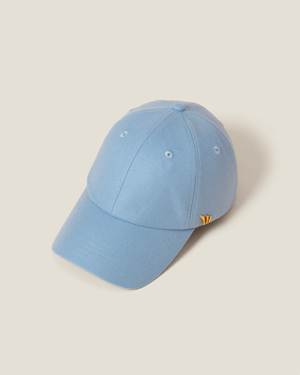 St. Moritz Wool women’s baseball cap by CHORD in light blue wool with gold-plated hardware