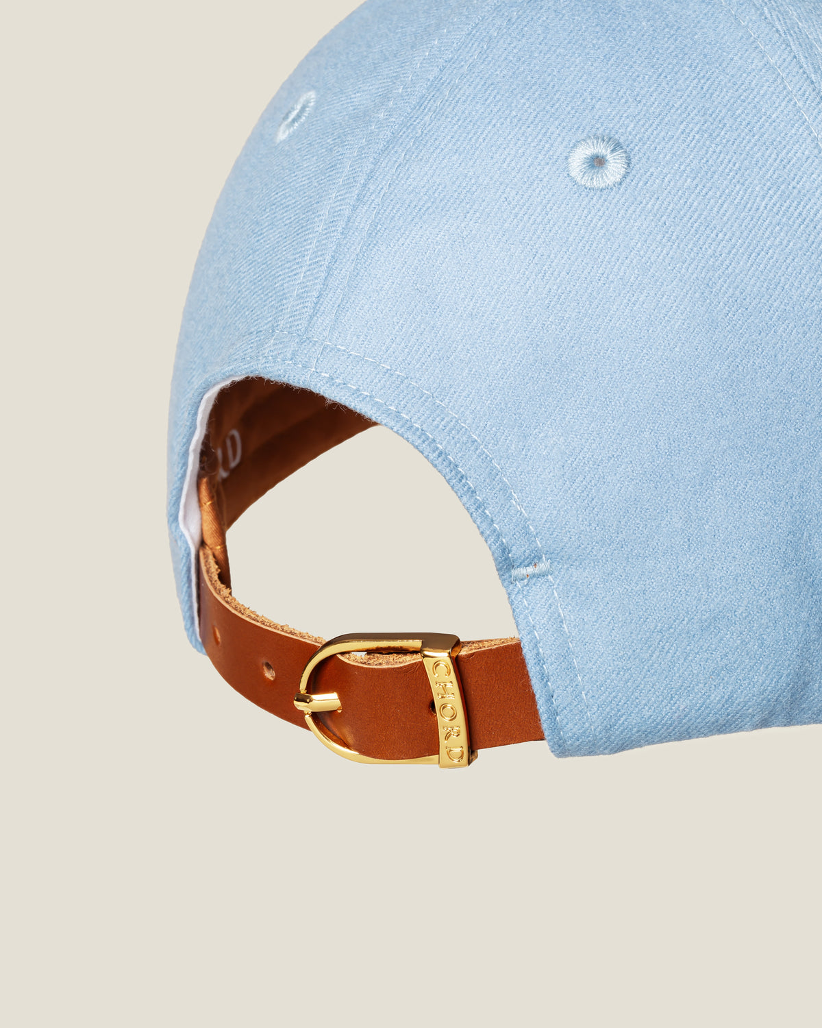 St. Moritz Wool women’s baseball cap by CHORD in light blue wool with gold-plated hardware